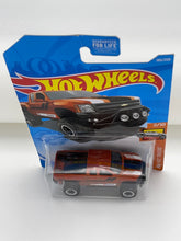 Load image into Gallery viewer, Hot Wheels Chevy Silverado Off Road (Orange)
